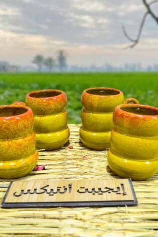 كوب من الفخار لون أصفر كهرمان صناعة مصرية يدوية 100% من انتاج ايجيبت أنتيكس